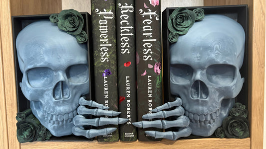 Dark Romance - 2x Greyish Blue Emerging Skull with Green Glitter Roses