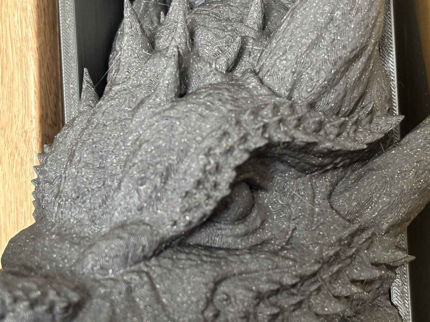 Space black emerging dragon book nook