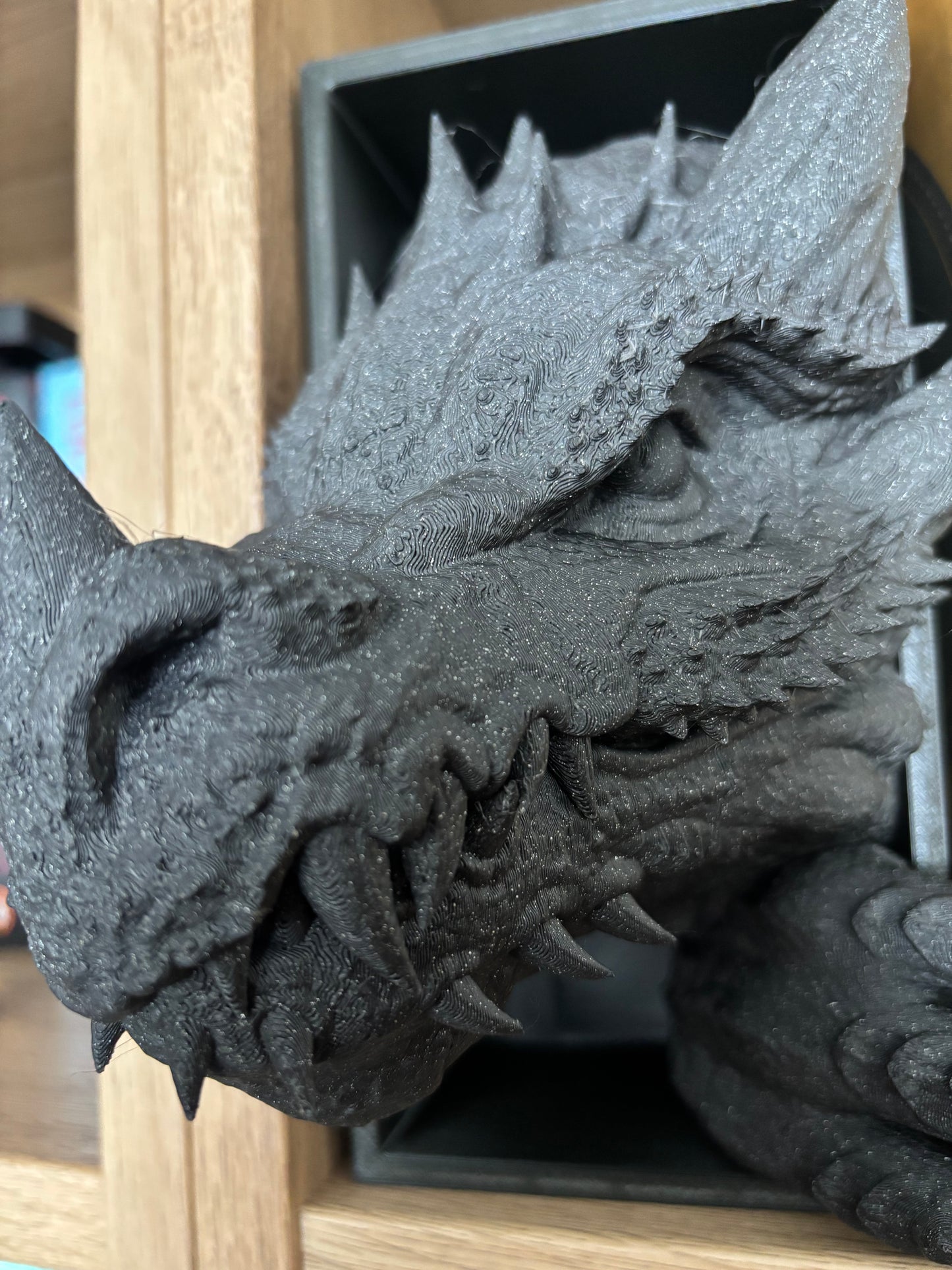 Space black emerging dragon book nook